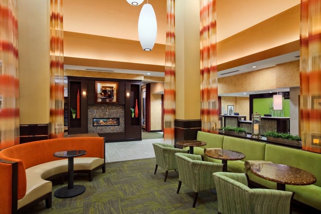 Lobby Seating and Fireplace © Hilton Garden Inn